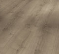 Vaaleanharmaa Parador Modular ONE Oak Pure Pearl Grey -design-lattia asennettuna lattiapinnaksi